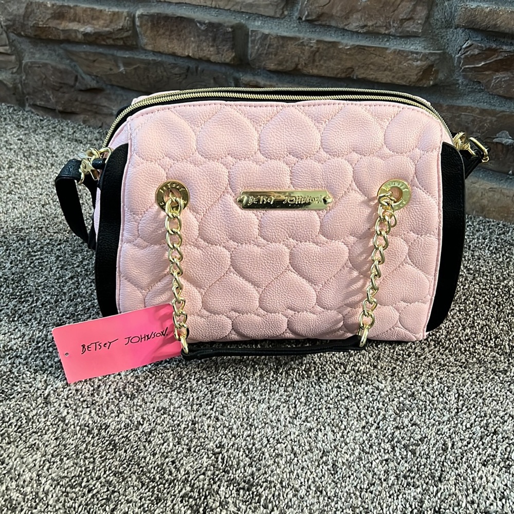 Brand new Light pink and black Betsey Johnson purse.